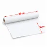 Rouleau de drap d'examen blanc déroulé – largeur 60 cm avec prédécoupes tous les 35 cm